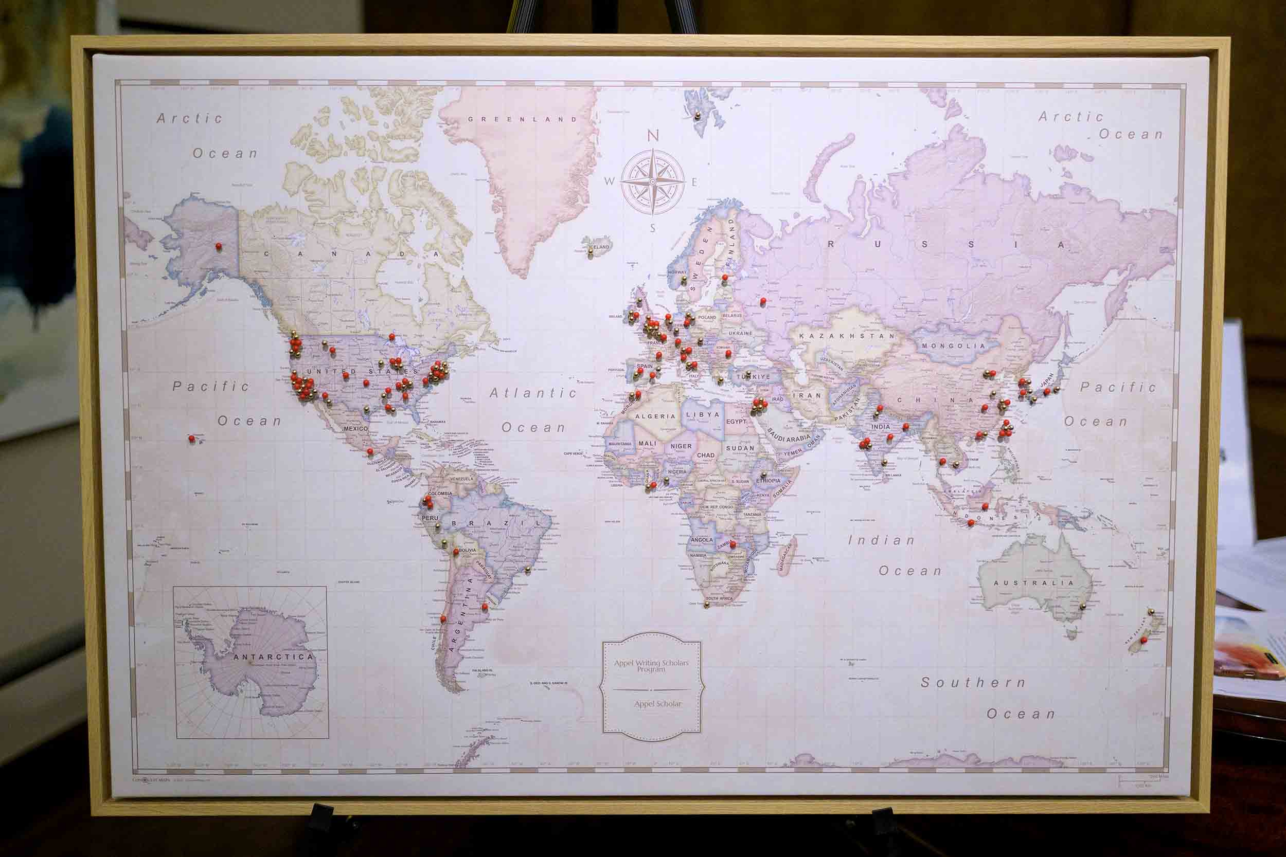 The map presented to Appel as a gift represents the locations where a Fellow has traveled to and written about since 2015.