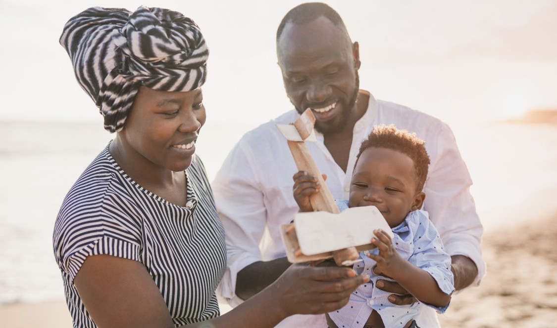 parents with child playing together