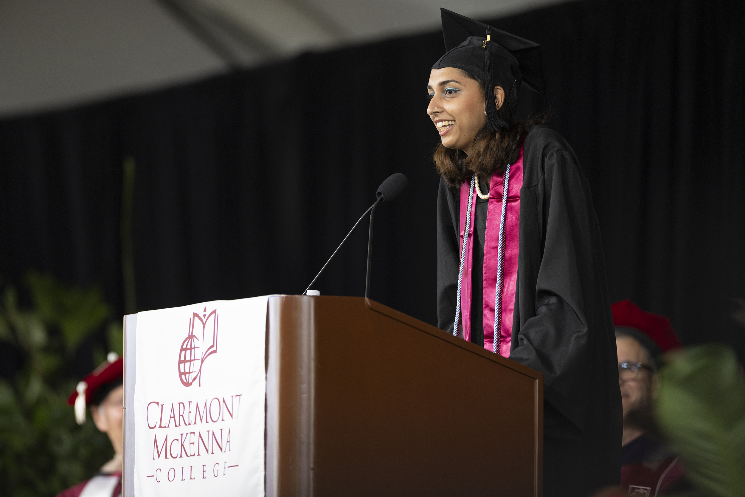 Class of 2020 Senior Class President Laleh Ahmad ’20 speaks at the podium during commencement for the classes of 2020 and 2021.