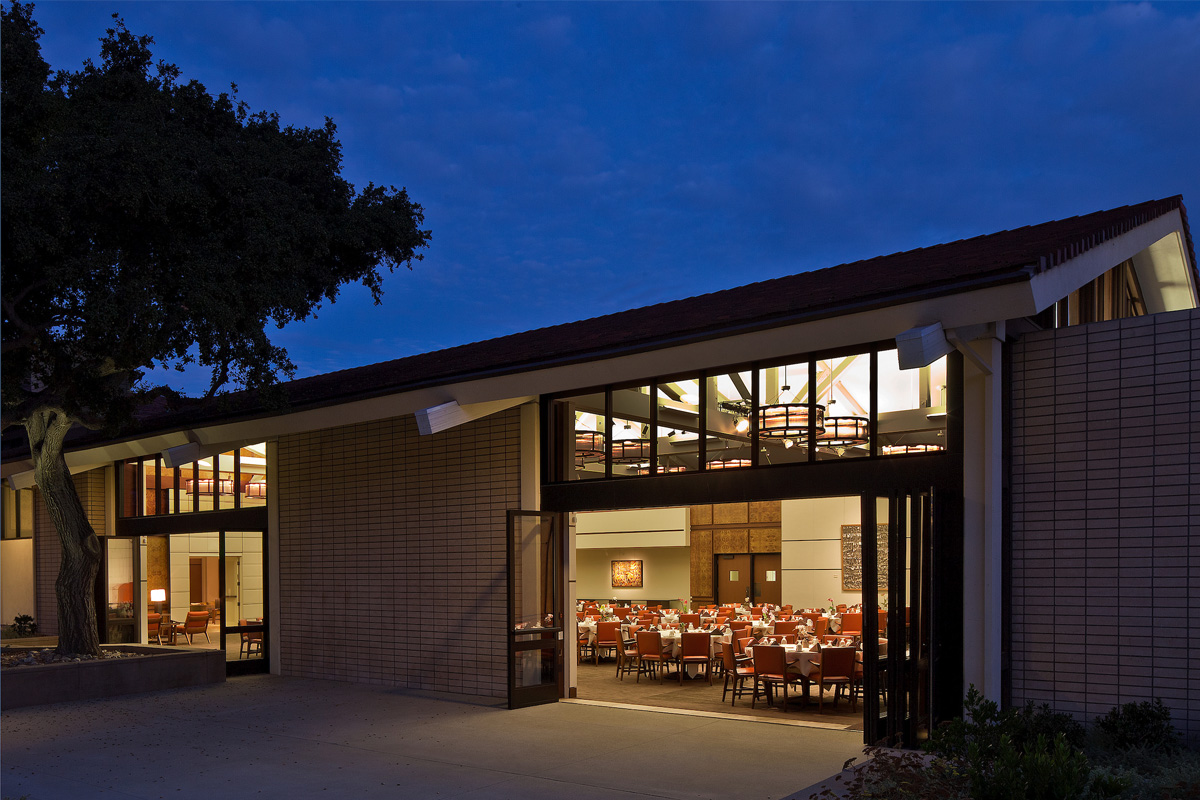 Exterior view of the Athenaeum building in the evening.