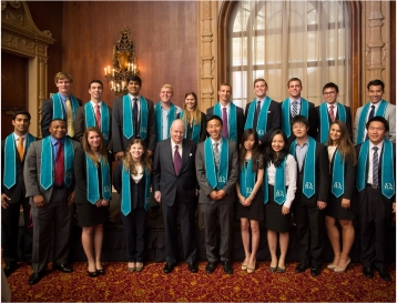 Robert Day, center, standing with Robert Day Scholars.