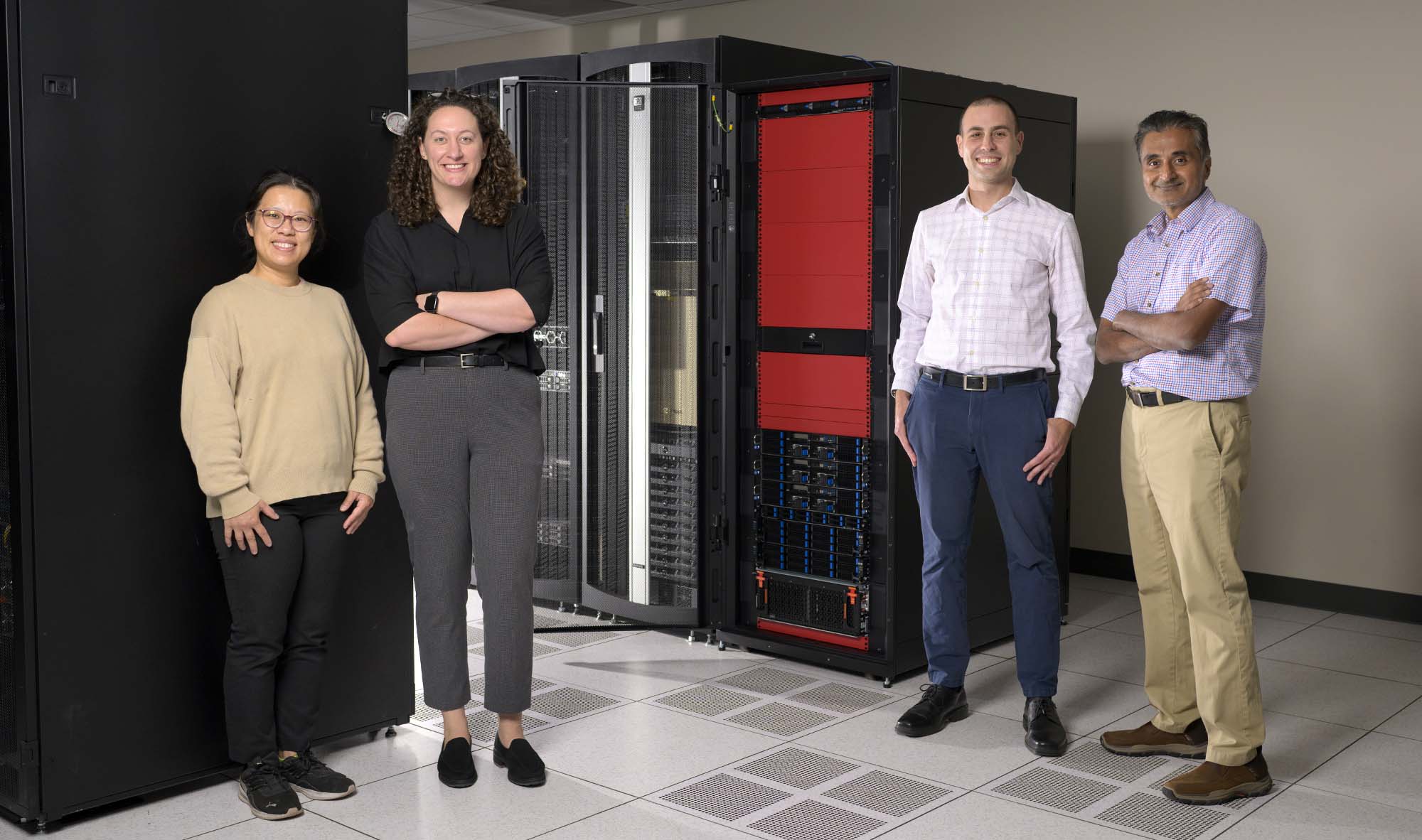 Science professors with the new high-performing computing cluster