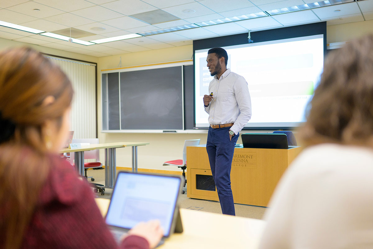 Professor Jean-Pierre Murray in front of class session.