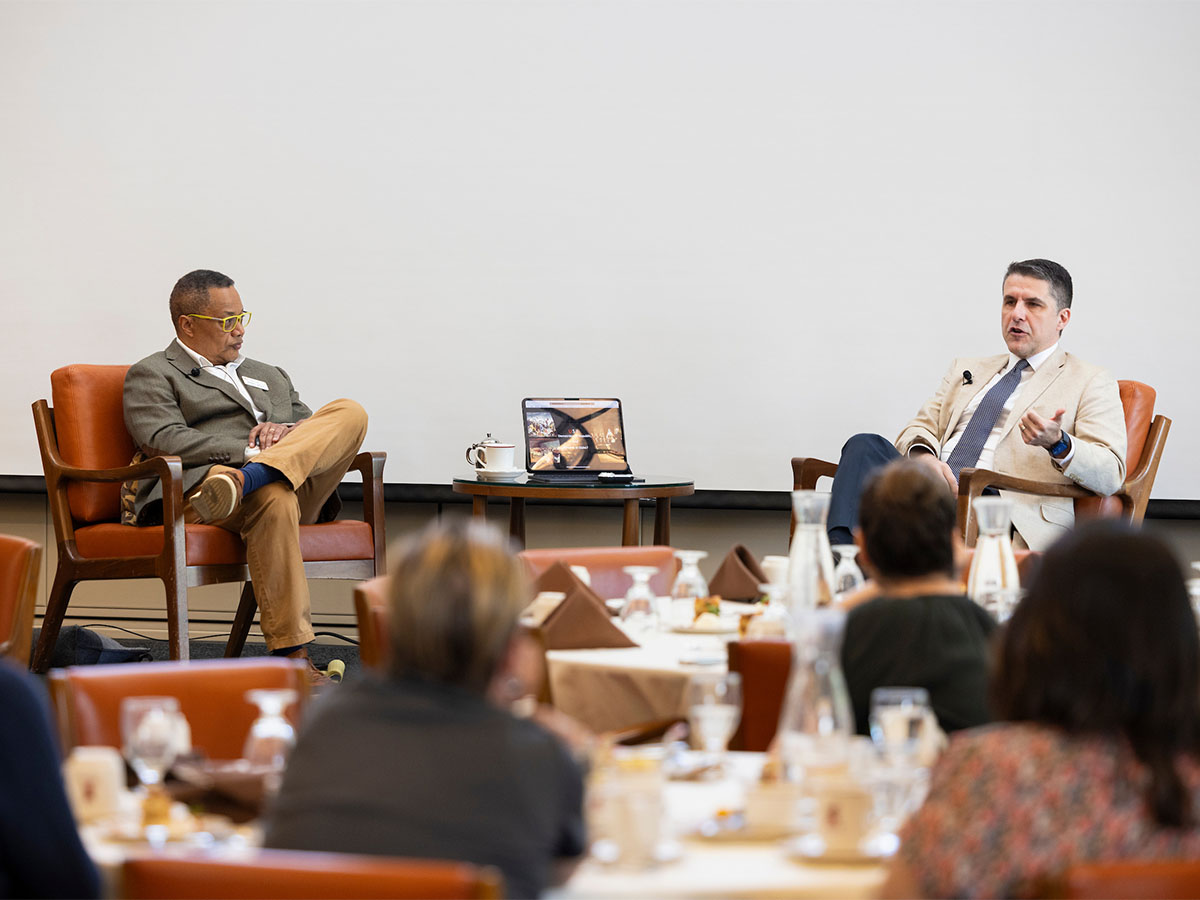 Vernon Grigg (left) in discussion with Professor Ioannis Evregenis (right) during Civitas event.