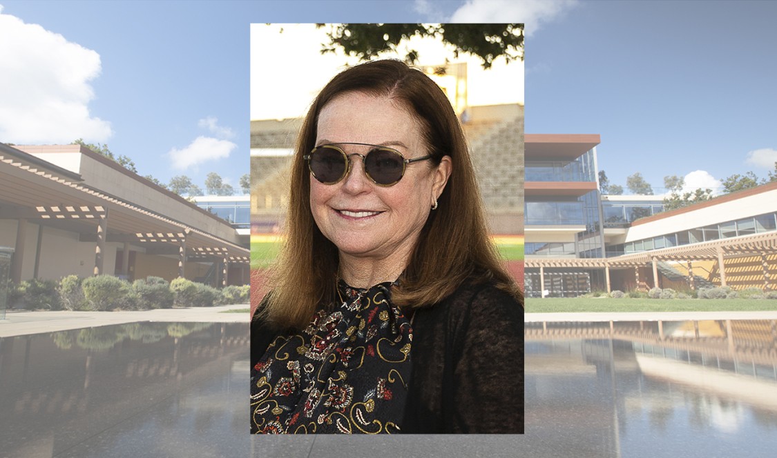 Portrait of Donna Wengert Neff P'21 in sunglasses, superimposed over a washed out photo of the Kube.