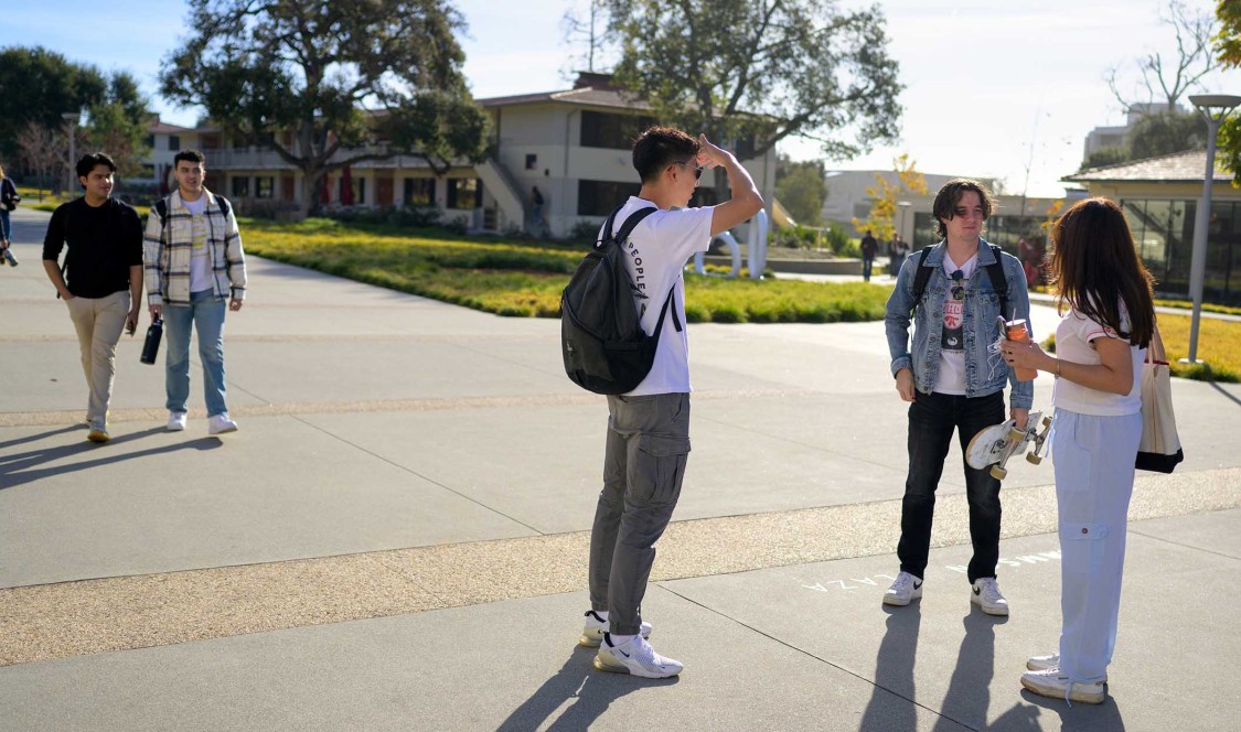Campus shot of students going to class.