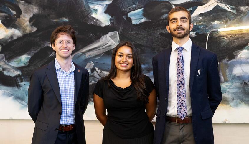 2026-27 Ath Fellows: Jasper Langley-Hawthorne ’27, Ambika (Bika) Gupta ’27, and Shivom Parihar ’28 standing in the Ath