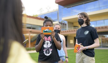 Students at the Leon Strauss Autism Clinic work with a participant of the program at CMC.