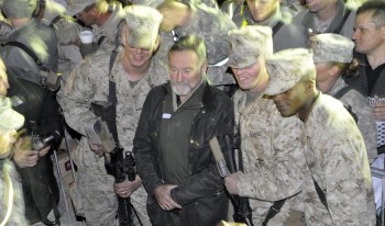 Robin Williams with U.S. Marines at a USO show in Afghanistan, December, 2010. Williams embraced the CMC ethos of service by giving his time, energy and talents to the troops. 