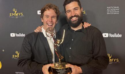 Chris Temple '12 and Zach Ingrasci '12 hold Sports Emmy