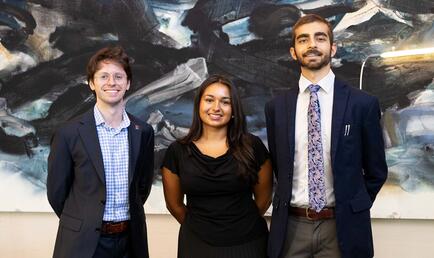 2026-27 Ath Fellows: Jasper Langley-Hawthorne ’27, Ambika (Bika) Gupta ’27, and Shivom Parihar ’28 standing in the Ath