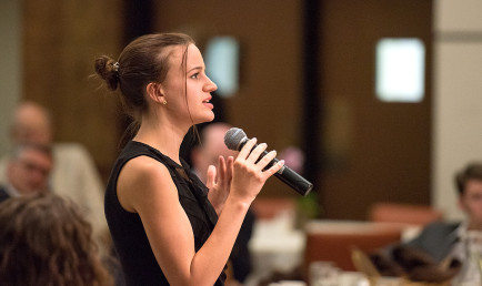 Student asking question at the Athenaeum