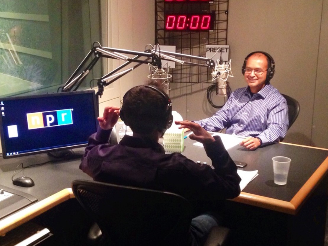 Ananda Ganguly with CGU professor Joshua Tasoff (back turned) in the NPR West studio