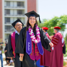 Students walking at Commencement 2023.