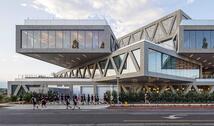 RDSC building with students running by