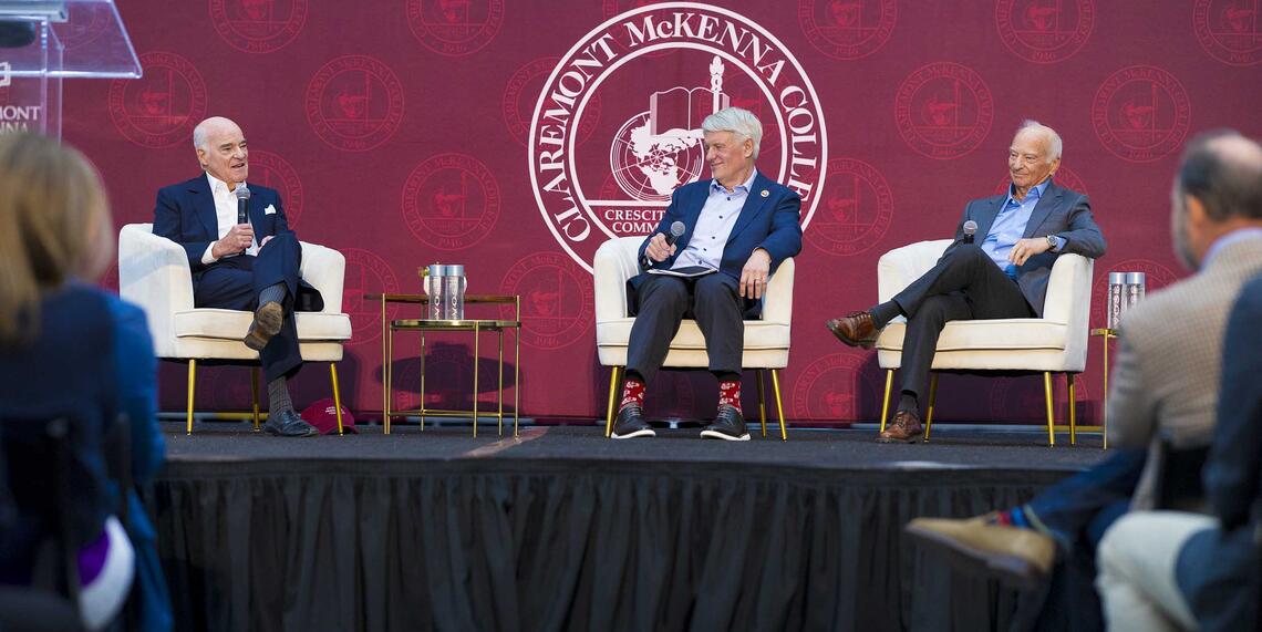 Ken Valach ’82, Henry Kravis ’67, and George Roberts ’66 P’93 on stage during their fireside chat at CMC Leads: The Summit.